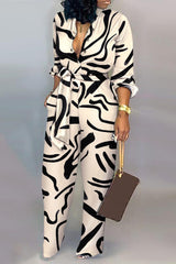 Abstract Print Long Sleeve Belted Jumpsuit